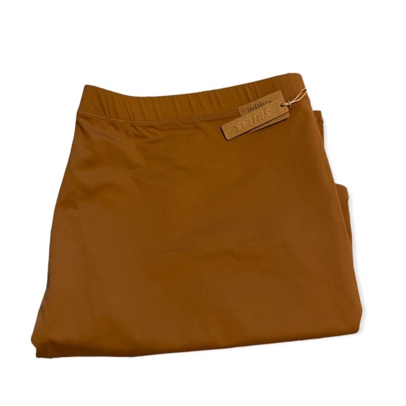 SKIMS MINI TUBE SWIM SKIRT COVERUP IN COLOR ALMOND - Picture 4 of 5